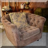 F126. Pair of tufted club chairs.